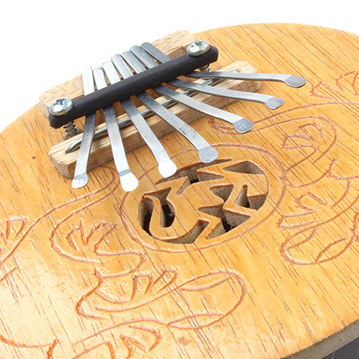 Coconut Thumb Piano-Siesta Crafts